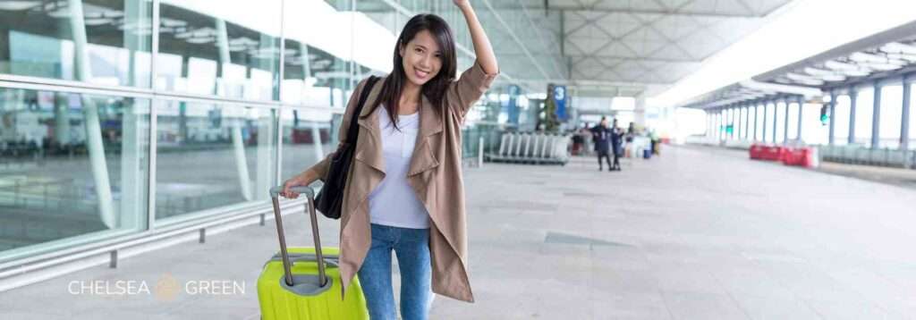 Woman at airport after travel vaccines