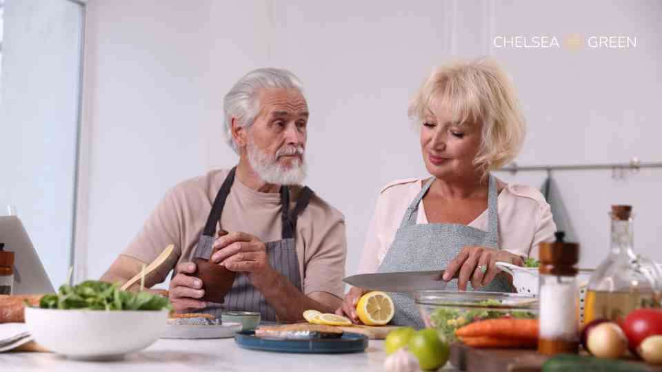 Older couple cooking for health on weight loss and diabetes medication
