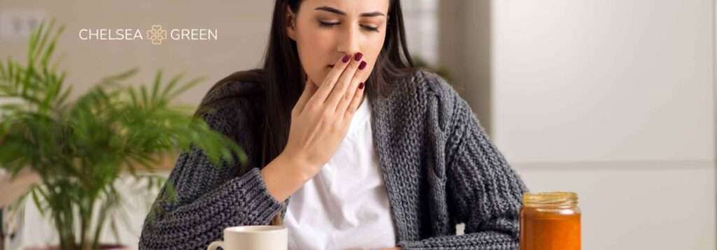 Woman experiencing nausea on weight loss injections
