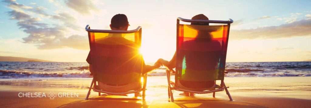 Couple enjoying sunset on the beach