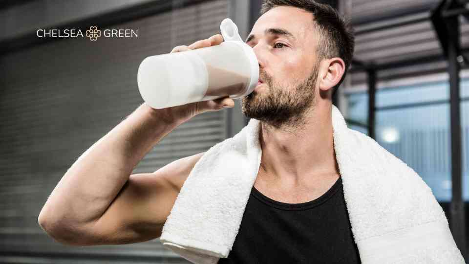 Drinking a shake in the gym to support weight management