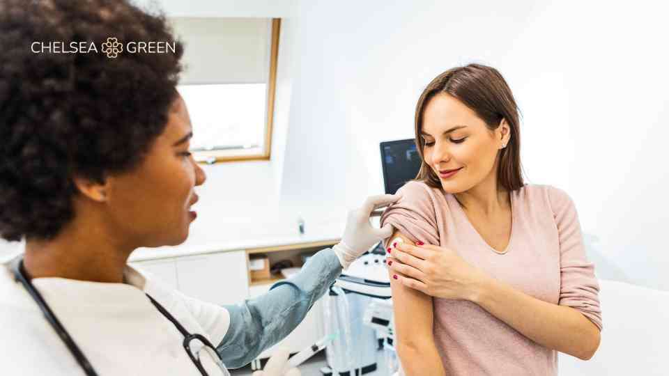 Administering vaccine into upper arm