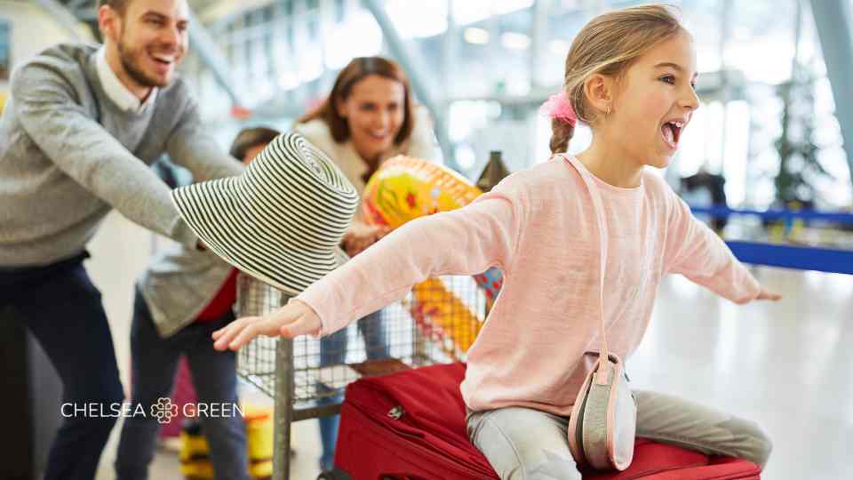 Family going on holiday through airport