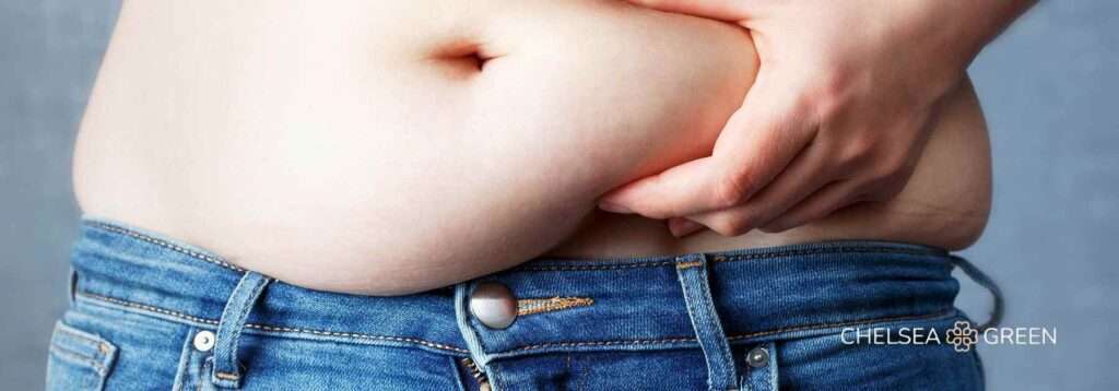 Holding stomach fat