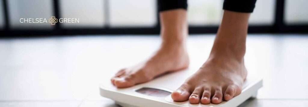 Standing on scales