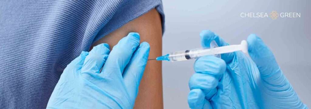 Administering vaccine into arm