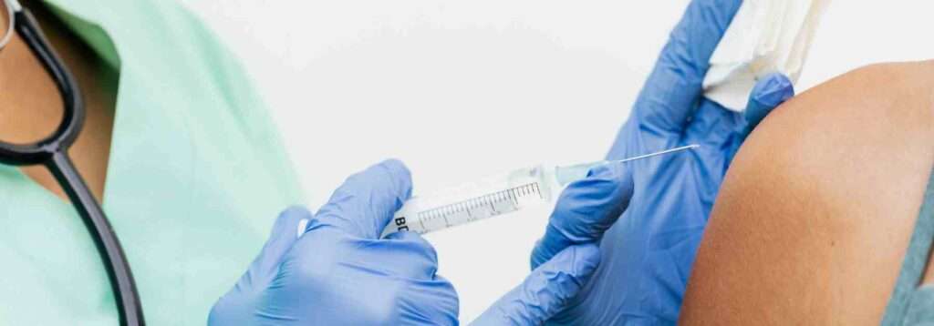 Person getting a travel vaccine