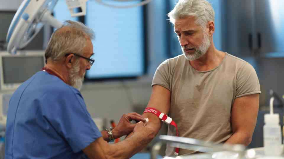 Man having a fasting blood test in London