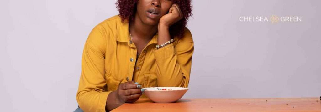 Hungry woman struggling with appetite for weight loss